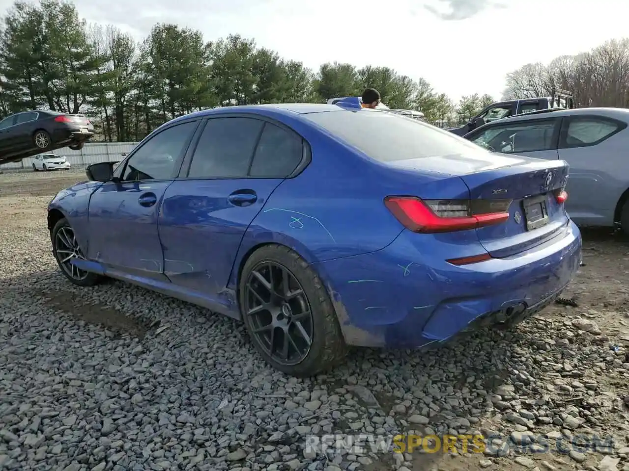 2 Photograph of a damaged car 3MW5U9J08M8B57278 BMW M3 2021