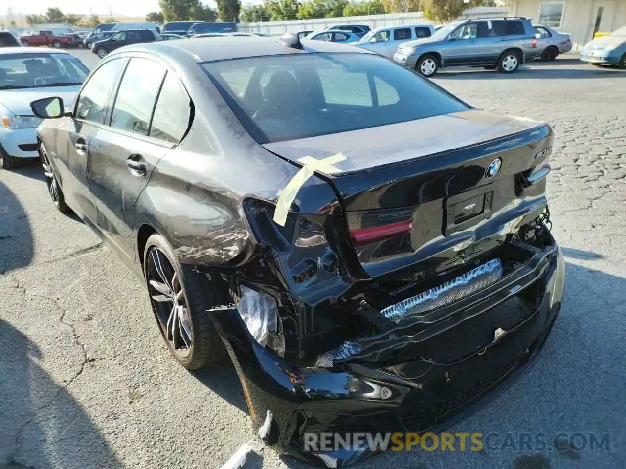 3 Photograph of a damaged car 3MW5U7J03N8C41630 BMW M3 2022