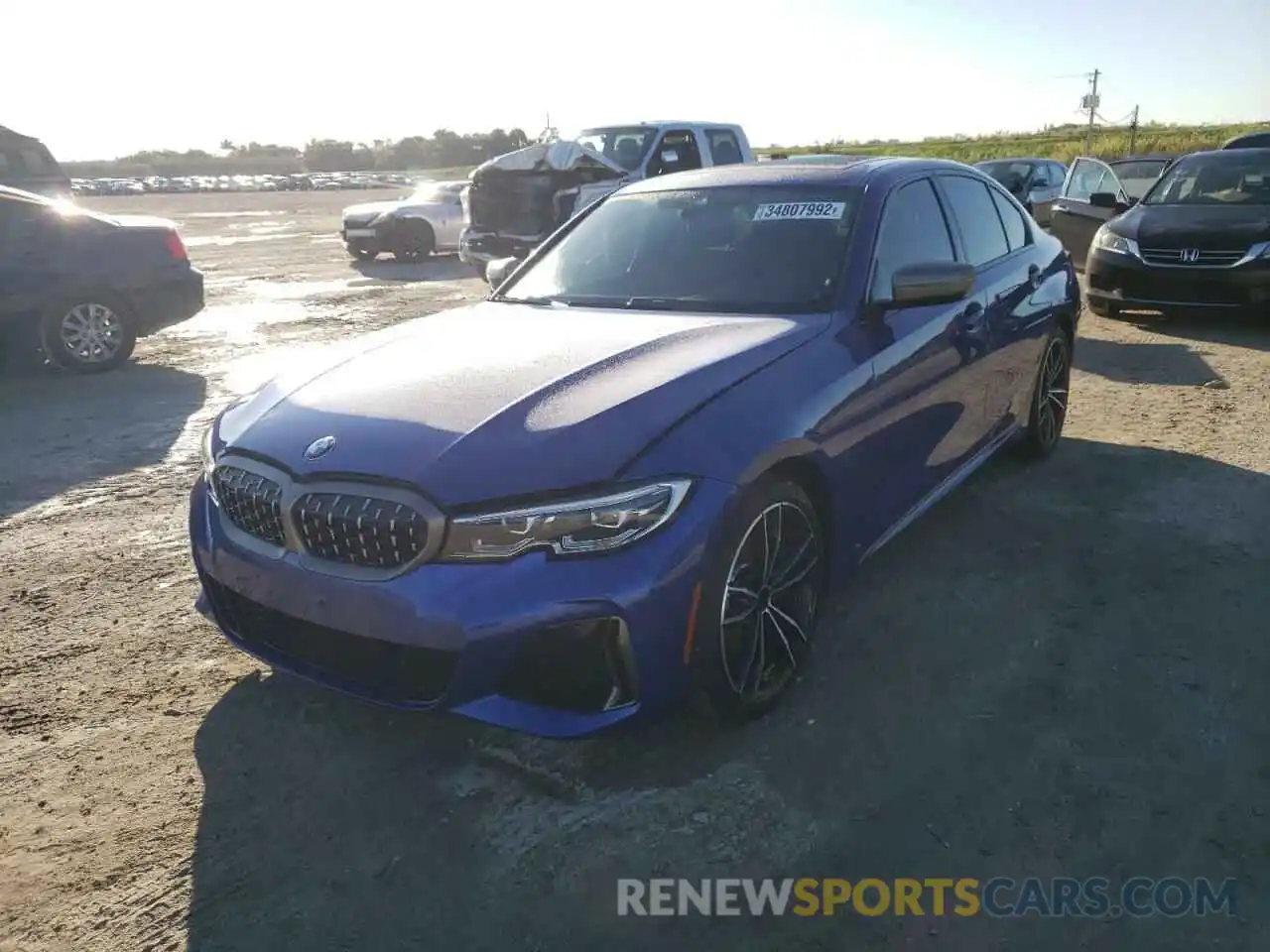 2 Photograph of a damaged car 3MW5U7J04N8C39823 BMW M3 2022