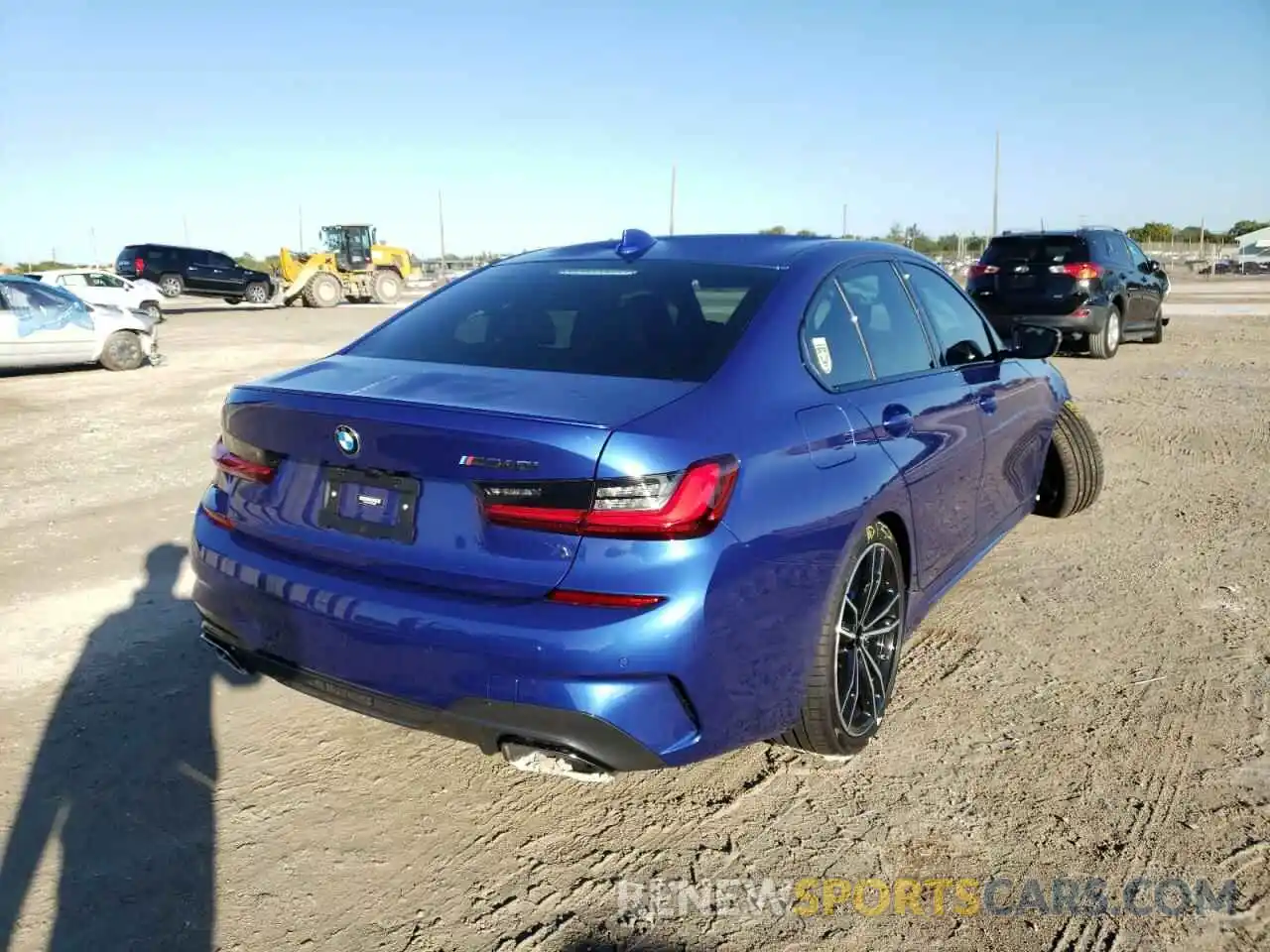 4 Photograph of a damaged car 3MW5U7J04N8C39823 BMW M3 2022