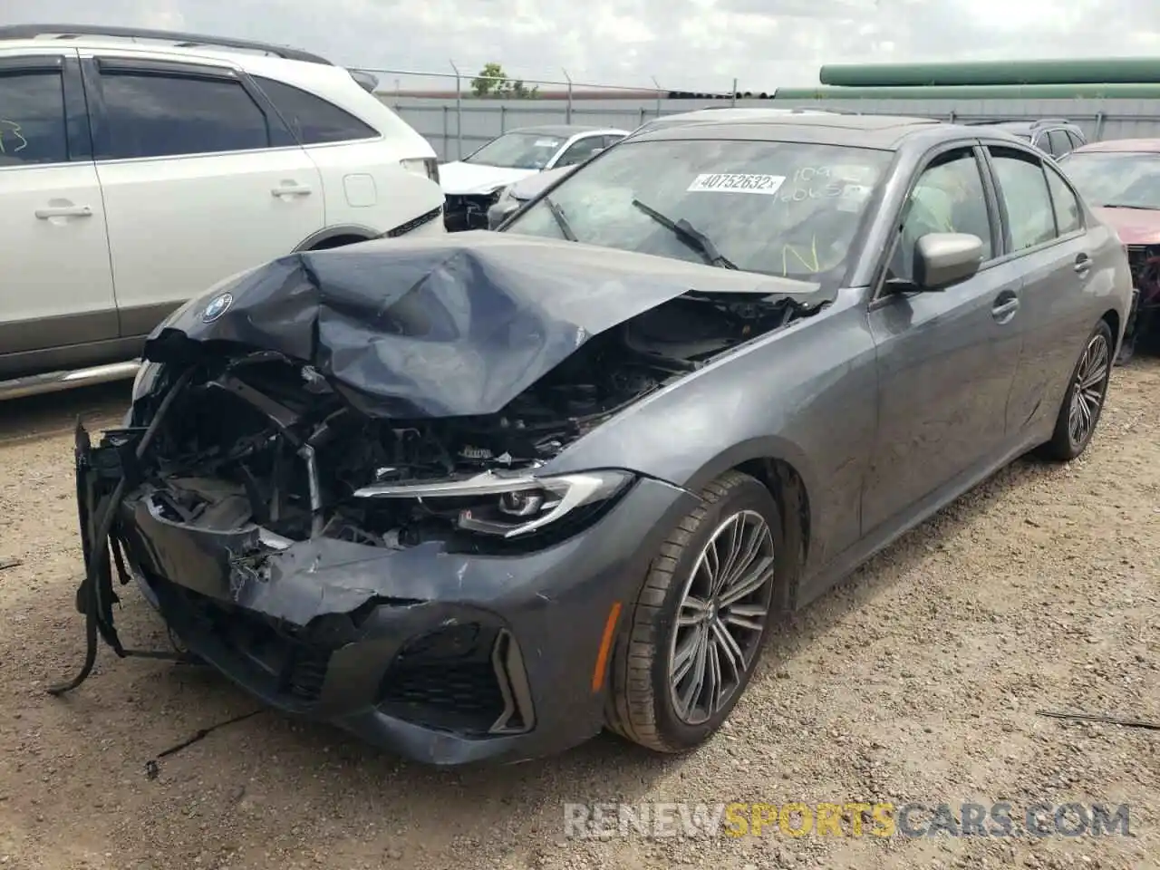 2 Photograph of a damaged car 3MW5U7J07N8C32784 BMW M3 2022