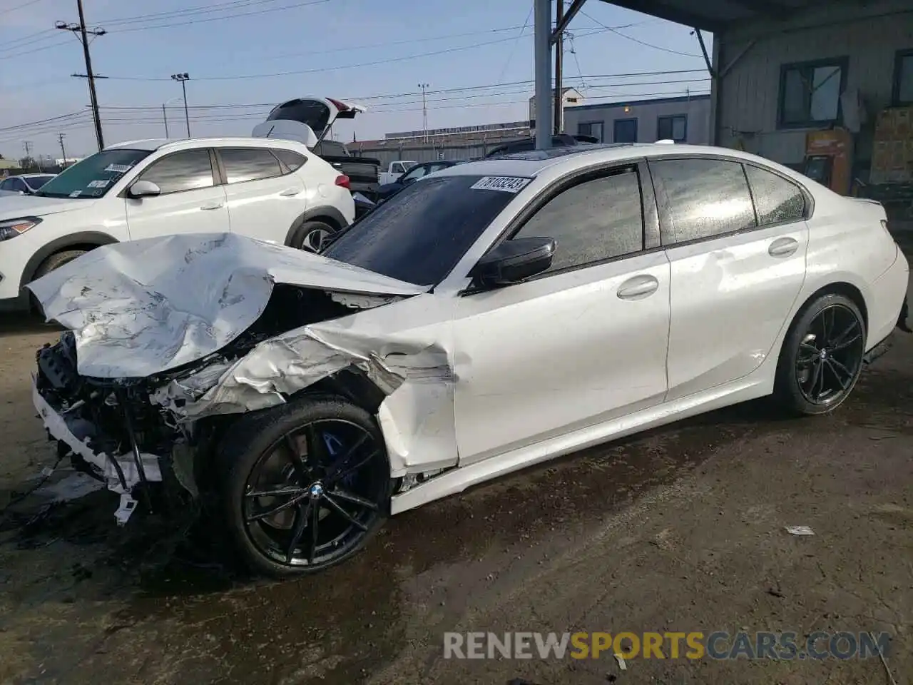1 Photograph of a damaged car 3MW5U7J07N8C74808 BMW M3 2022