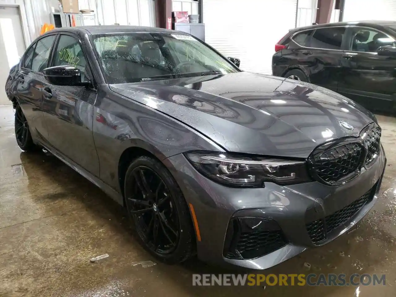 1 Photograph of a damaged car 3MW5U9J01N8C41105 BMW M3 2022