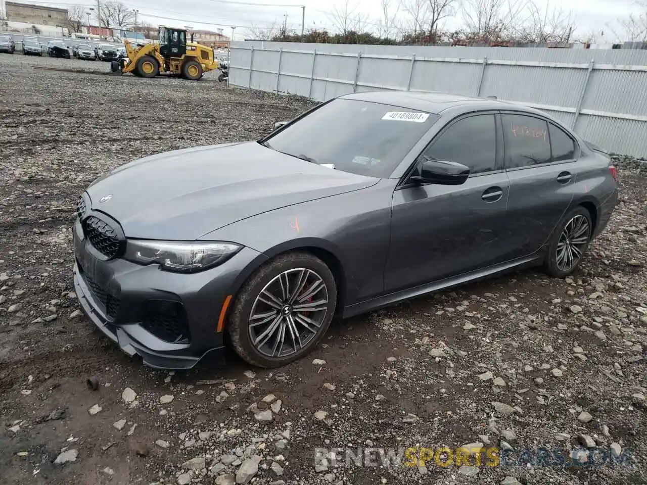 1 Photograph of a damaged car 3MW5U9J01N8C76095 BMW M3 2022