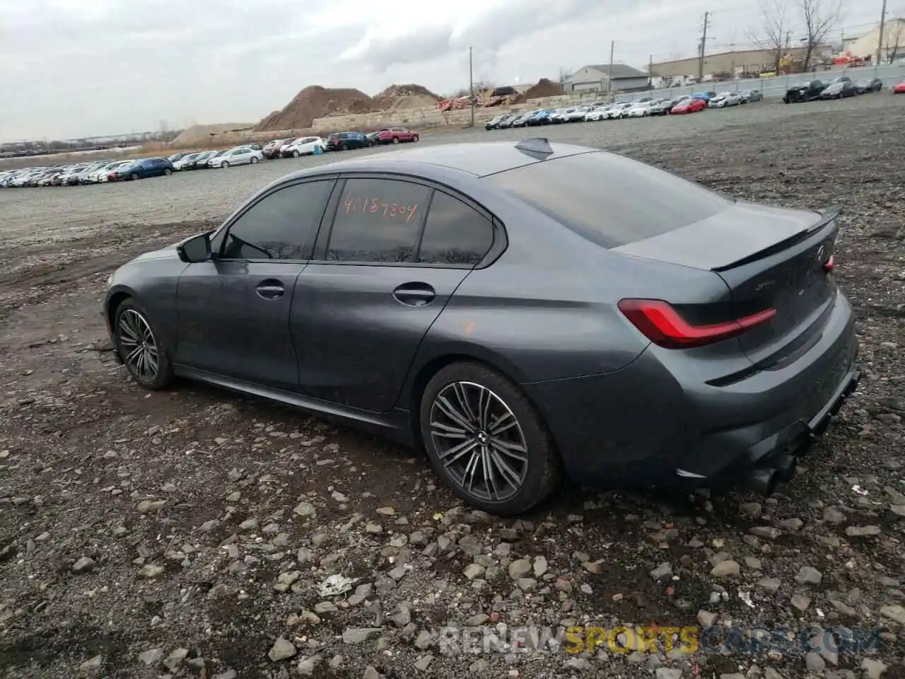 2 Photograph of a damaged car 3MW5U9J01N8C76095 BMW M3 2022