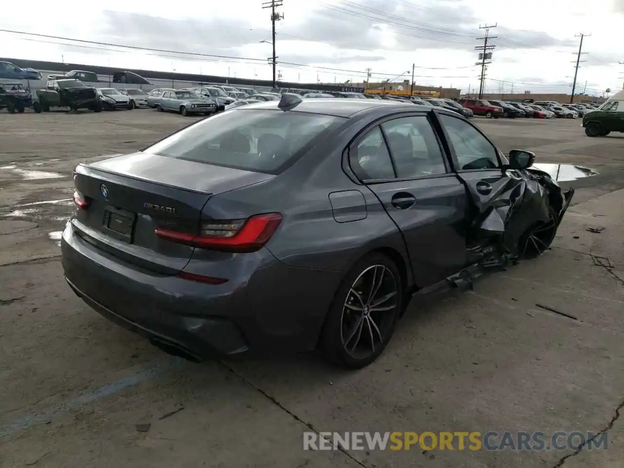 4 Photograph of a damaged car WBA5U7C03NFL75705 BMW M3 2022