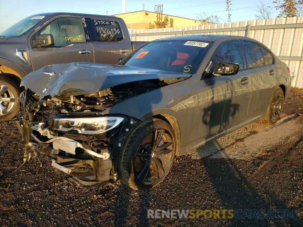 2 Photograph of a damaged car WBA5U9C0XNFL99950 BMW M3 2022