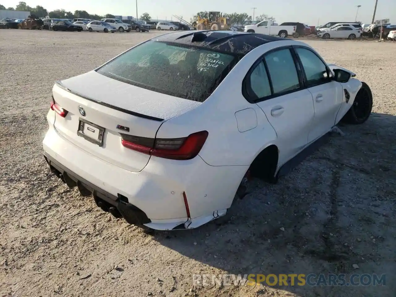 4 Photograph of a damaged car WBS33AY03NFM36952 BMW M3 2022