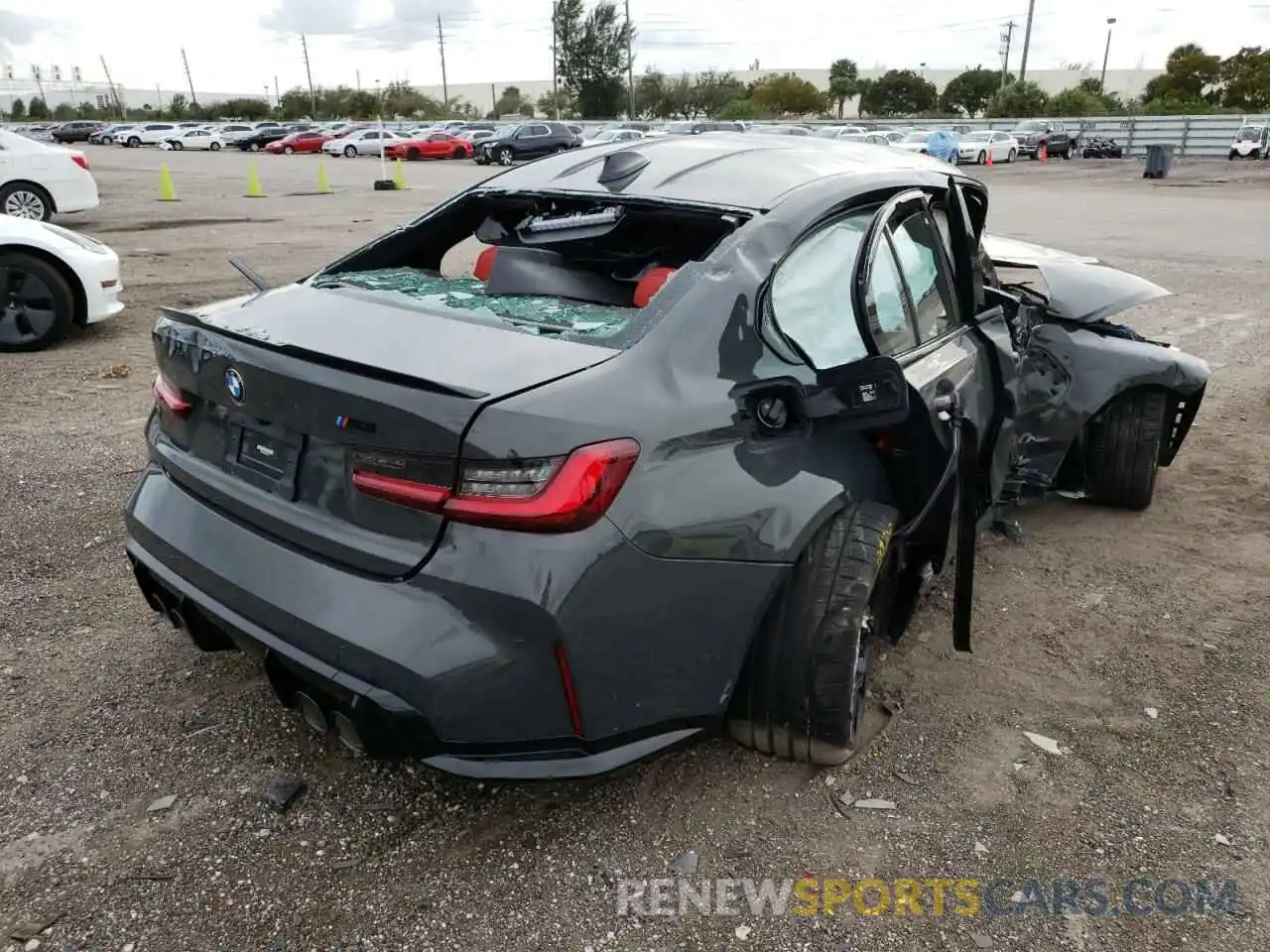 4 Photograph of a damaged car WBS33AY05NFL86779 BMW M3 2022