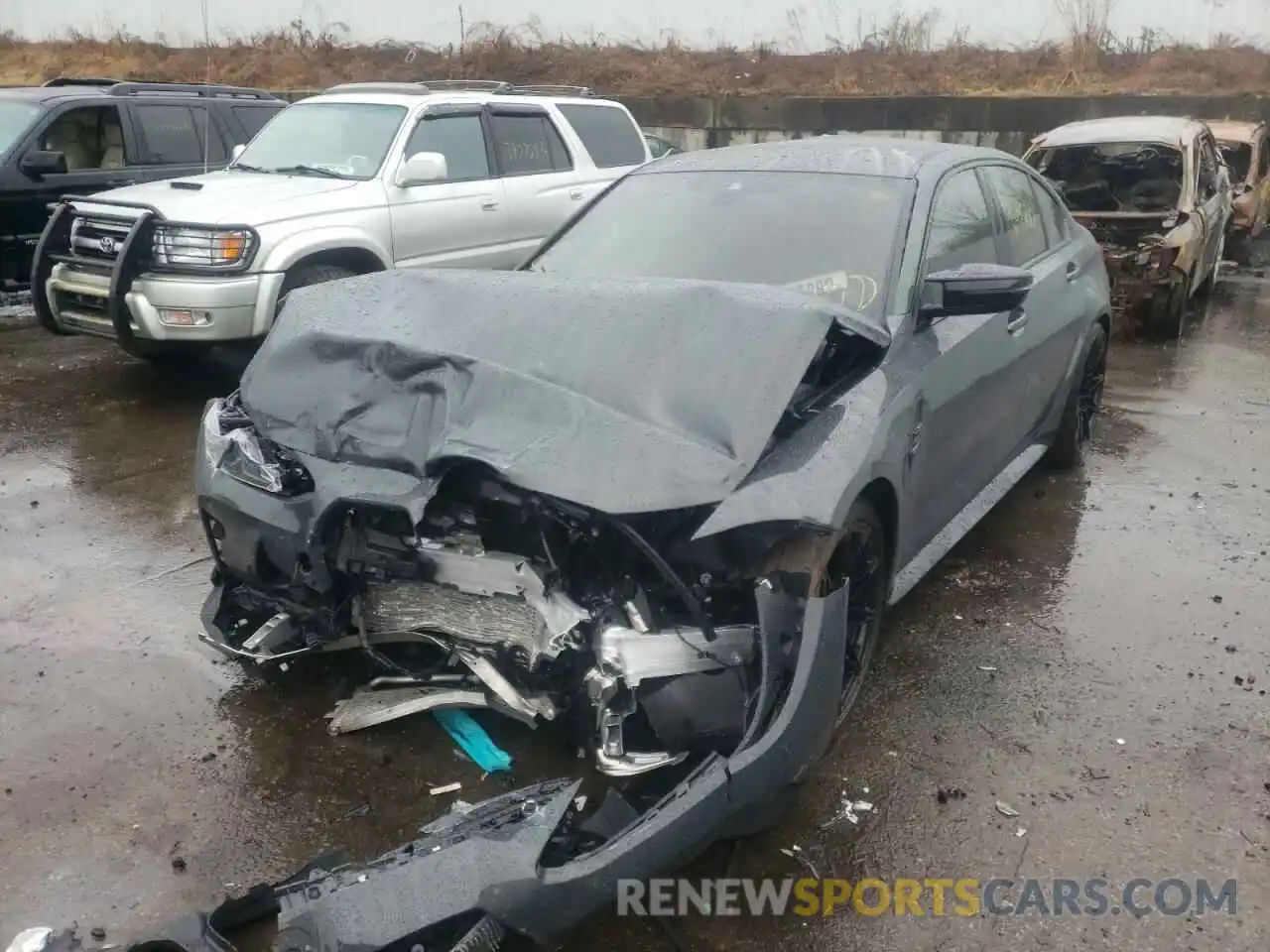 2 Photograph of a damaged car WBS43AY01NFL64993 BMW M3 2022