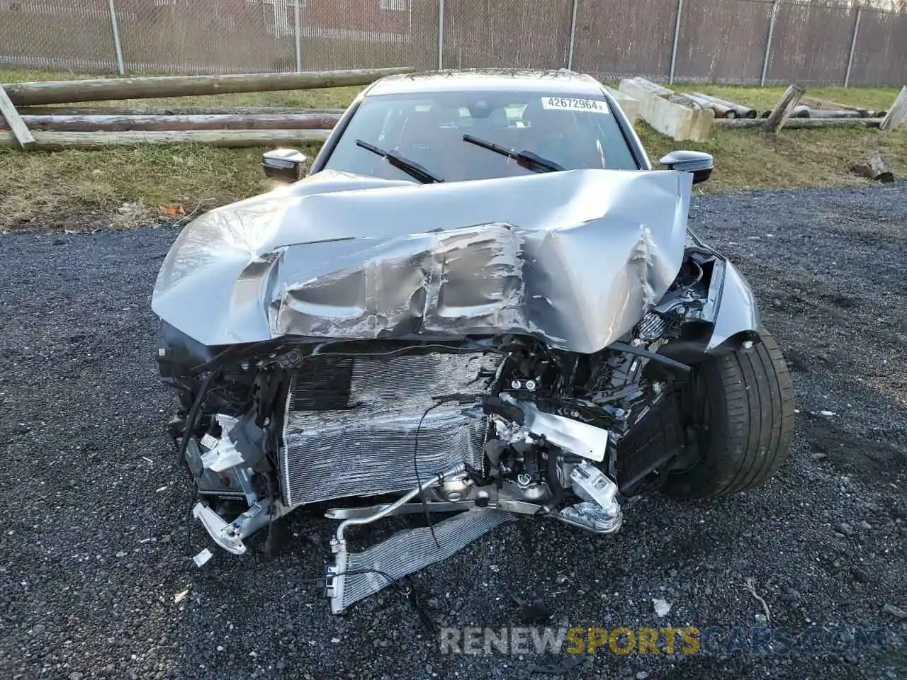5 Photograph of a damaged car WBS43AY03NFL99387 BMW M3 2022