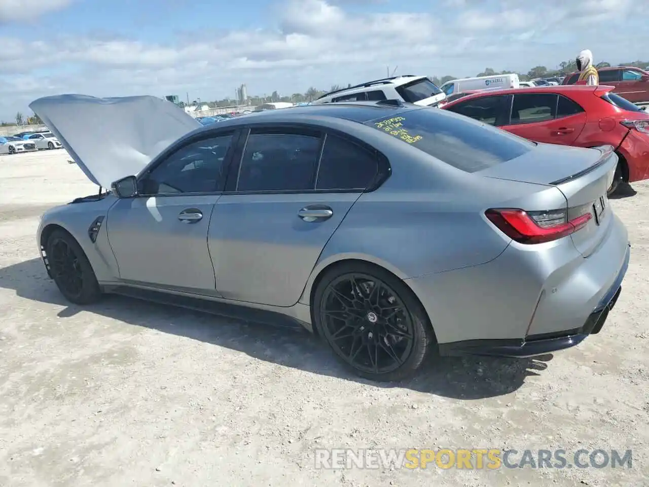 2 Photograph of a damaged car WBS53AY06PFP03299 BMW M3 2023