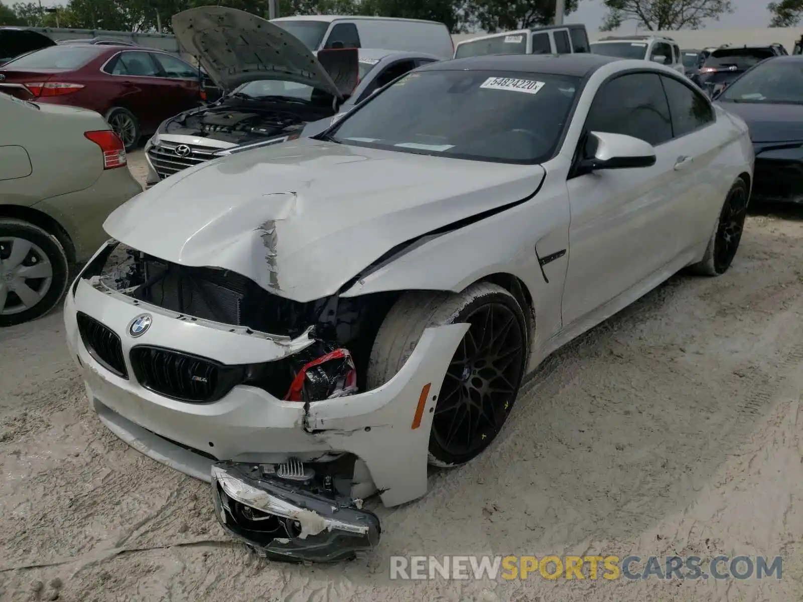 2 Photograph of a damaged car WBS4Y9C51KAG67237 BMW M4 2019