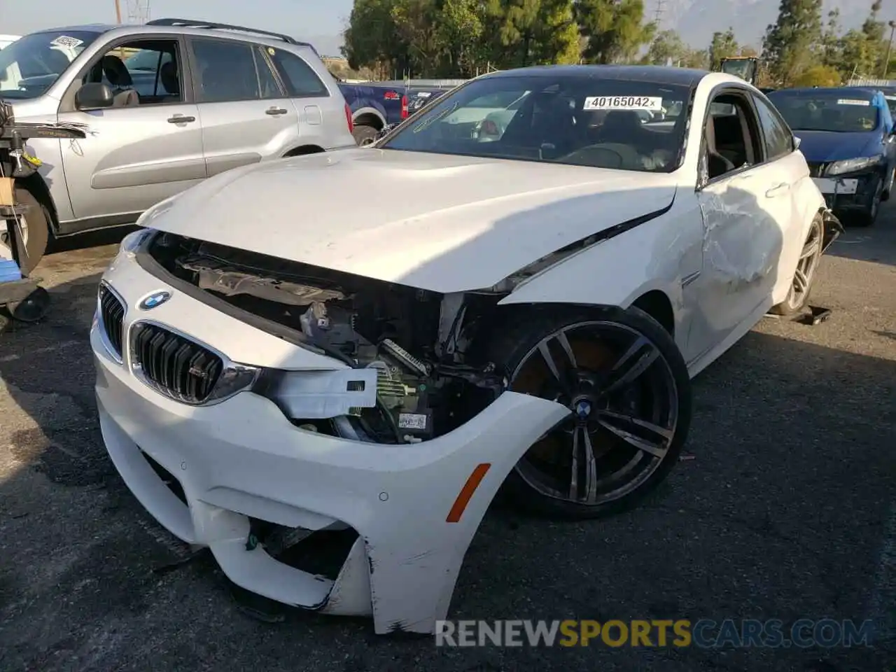 2 Photograph of a damaged car WBS4Y9C52KAG66937 BMW M4 2019