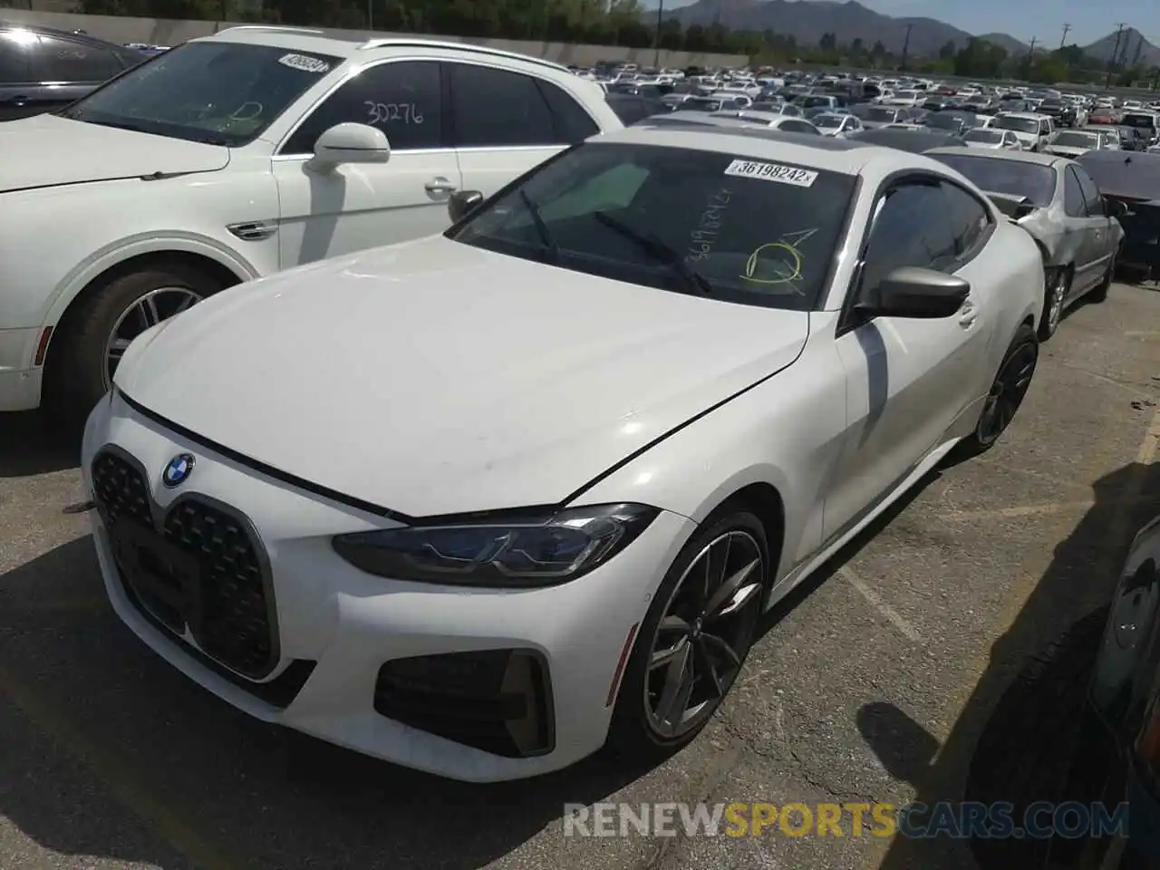 2 Photograph of a damaged car WBA13AR02MCF46694 BMW M4 2021