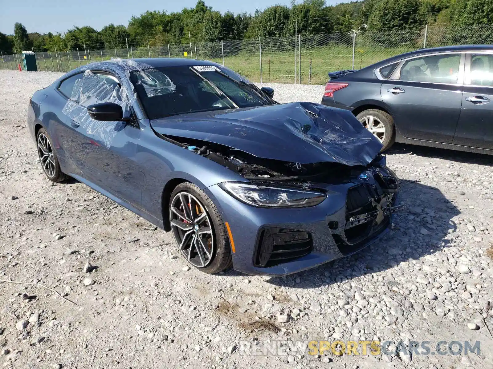 1 Photograph of a damaged car WBA13AR04MCG04157 BMW M4 2021