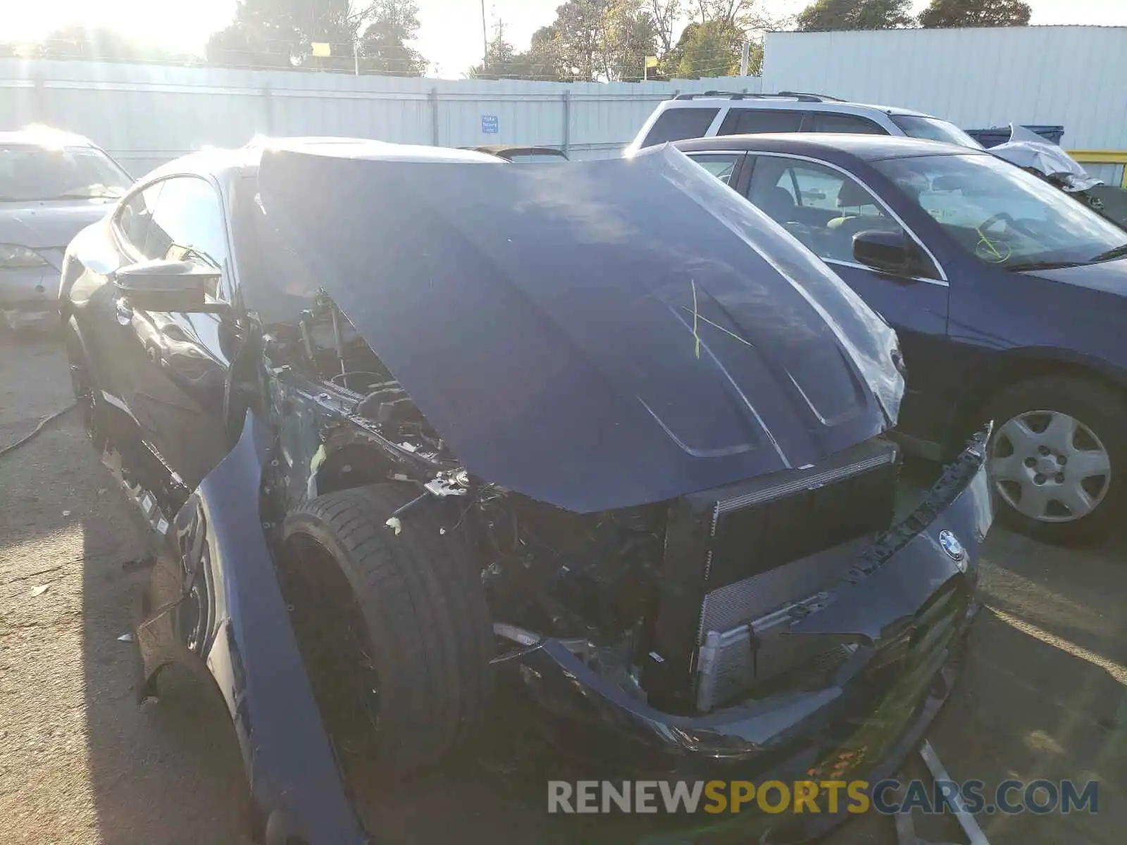 1 Photograph of a damaged car WBS33AZ06MCG48696 BMW M4 2021