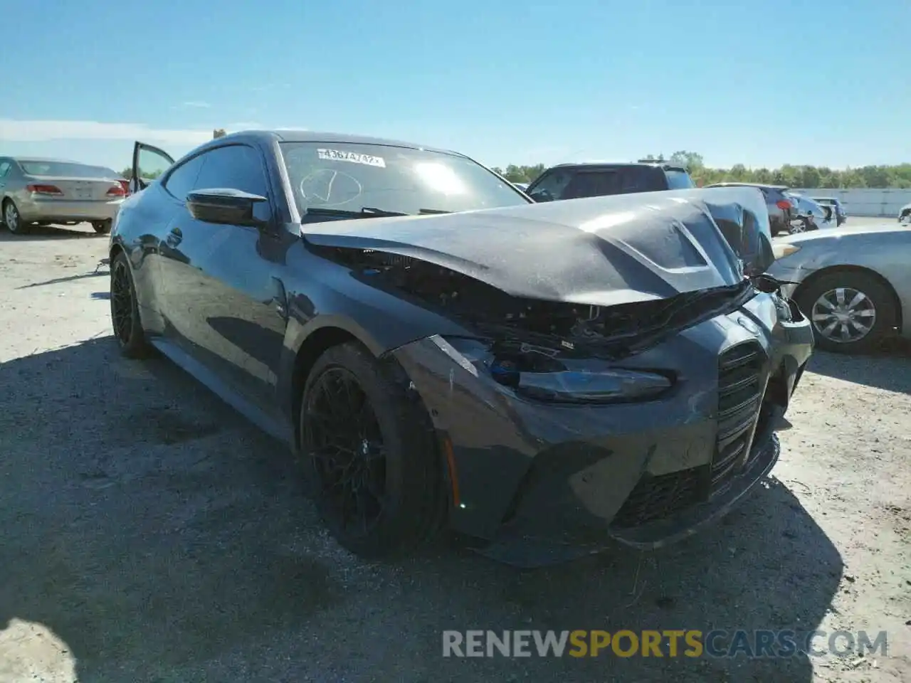 1 Photograph of a damaged car WBS53AZ09MCH13923 BMW M4 2021