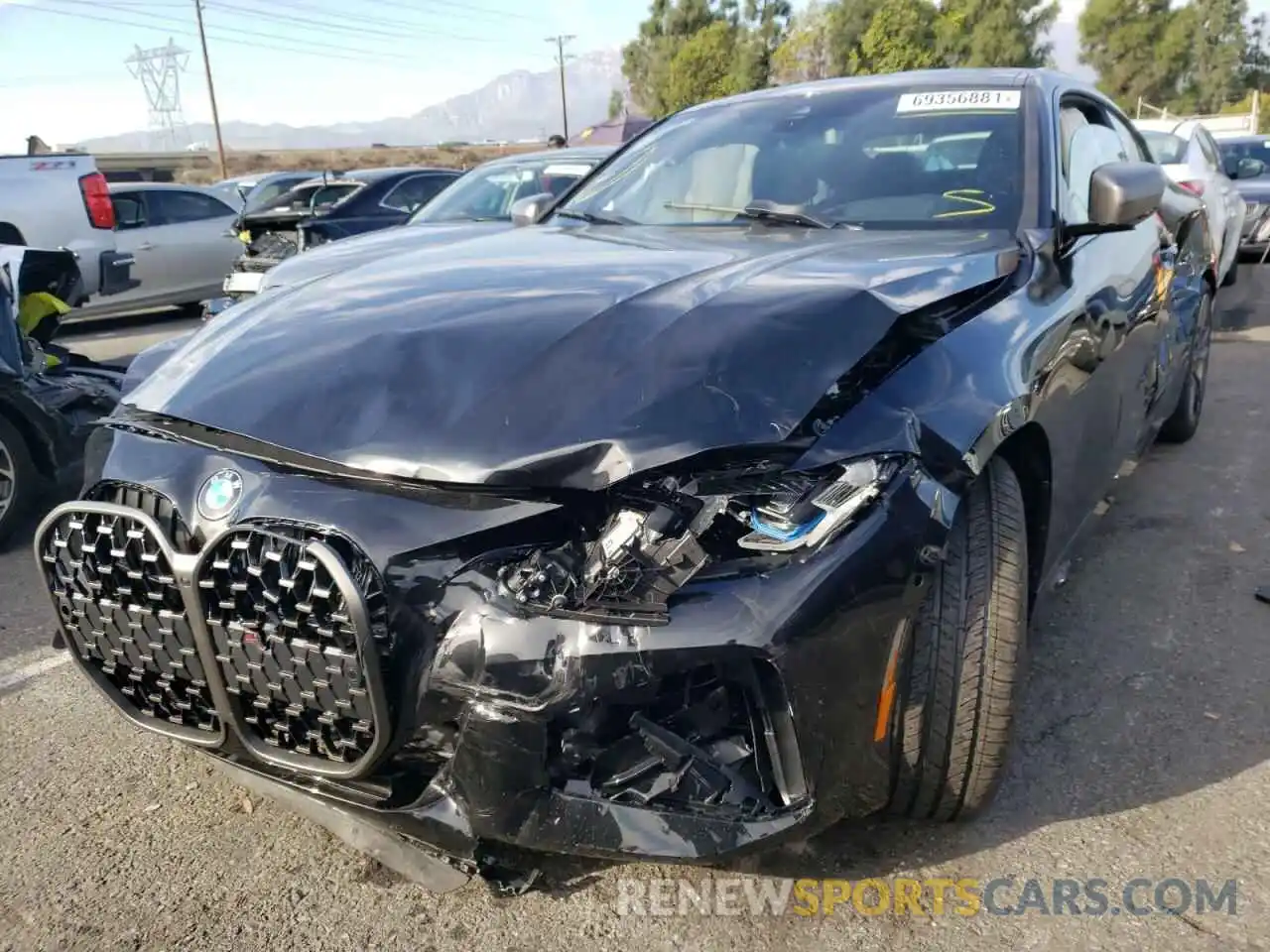 2 Photograph of a damaged car WBA13AR06NCJ22840 BMW M4 2022