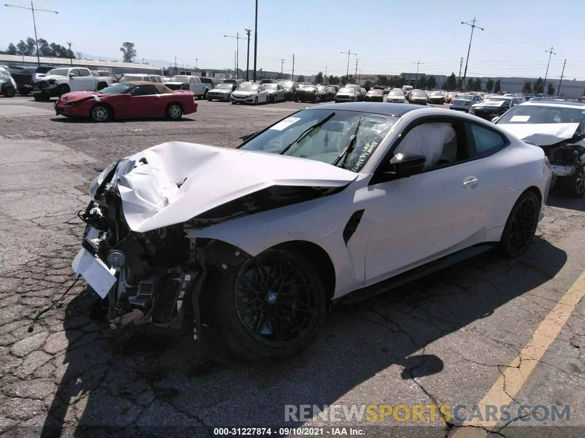 2 Photograph of a damaged car WBS33AZ06NCH60349 BMW M4 2022