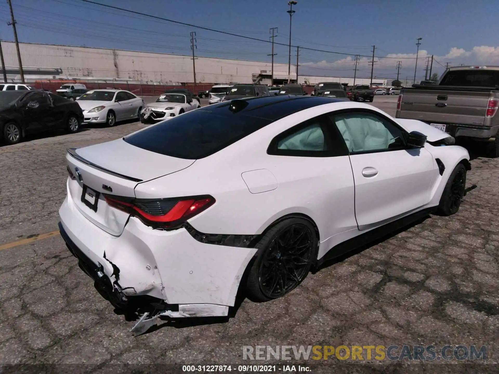 4 Photograph of a damaged car WBS33AZ06NCH60349 BMW M4 2022