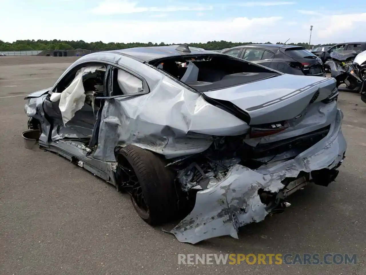 3 Photograph of a damaged car WBS43AZ08NCJ95491 BMW M4 2022