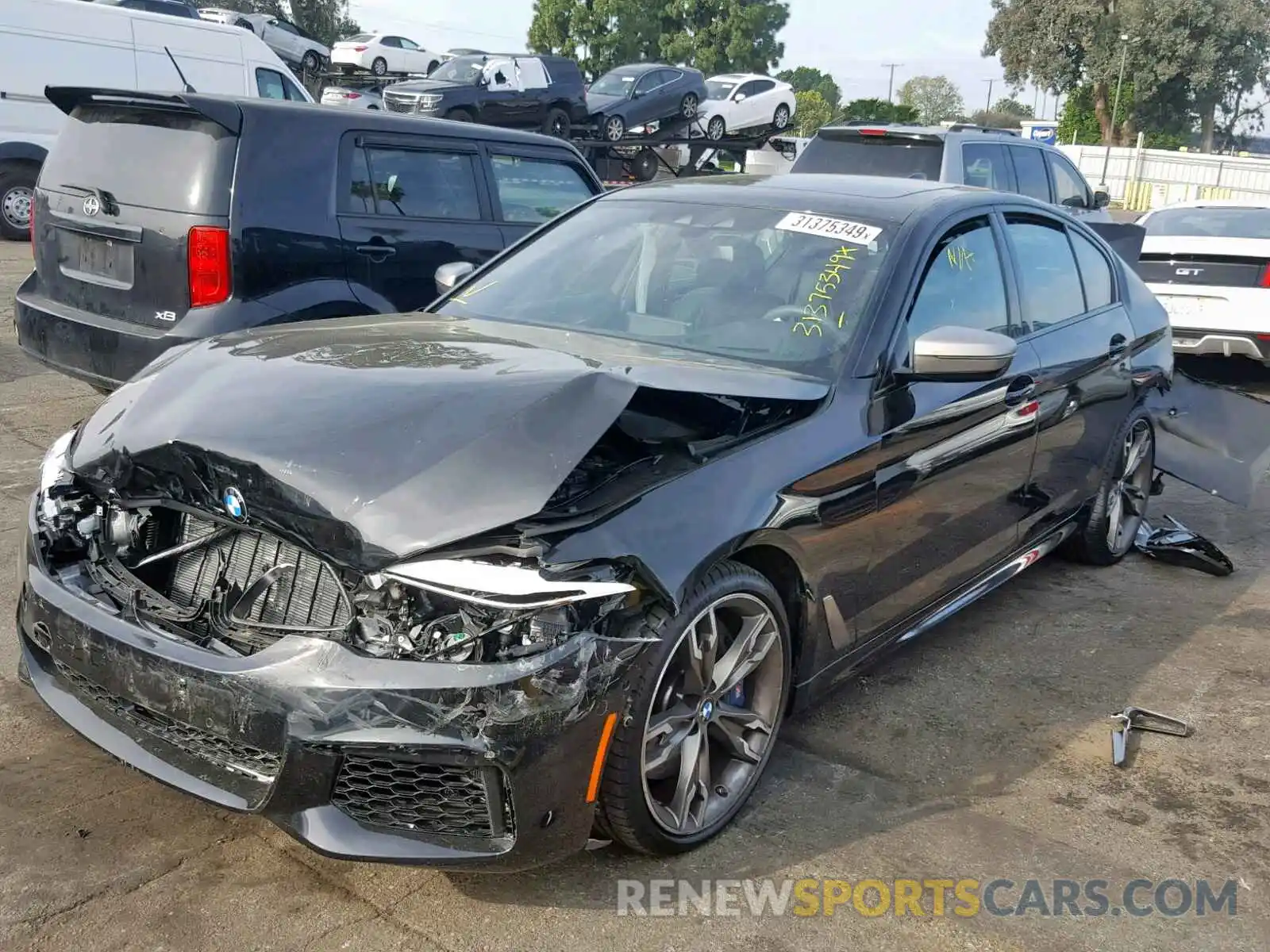 2 Photograph of a damaged car WBAJB9C55KB288032 BMW M5 2019