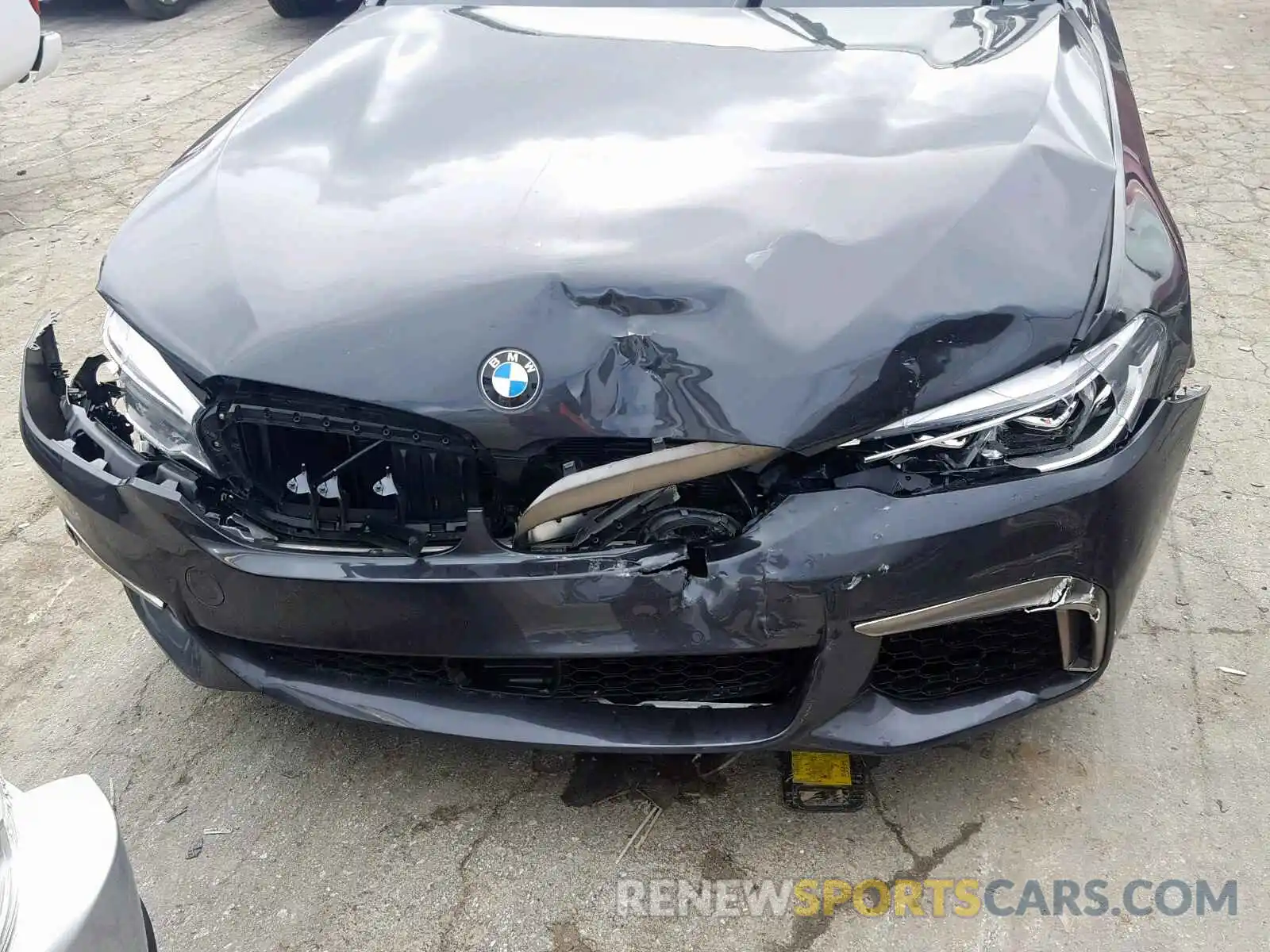 7 Photograph of a damaged car WBAJB9C56KB288024 BMW M5 2019