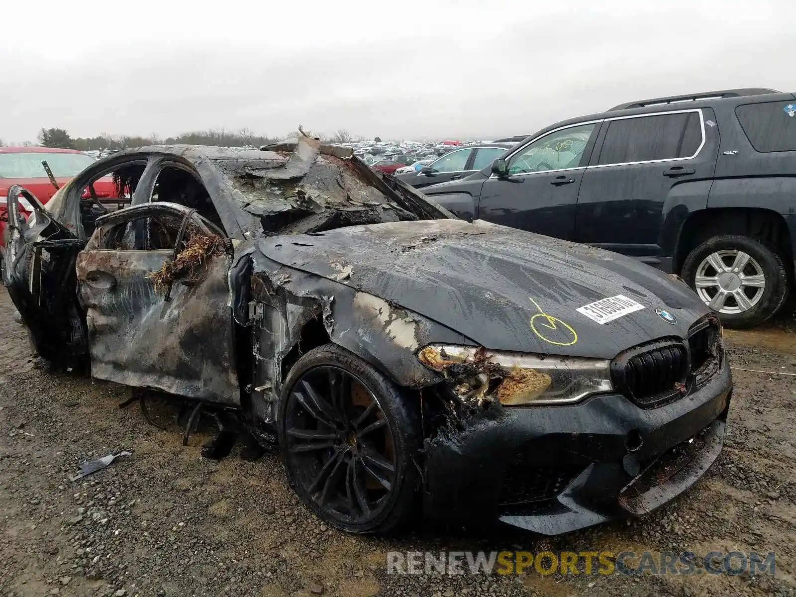 1 Photograph of a damaged car WBSJF0C52KB446824 BMW M5 2019