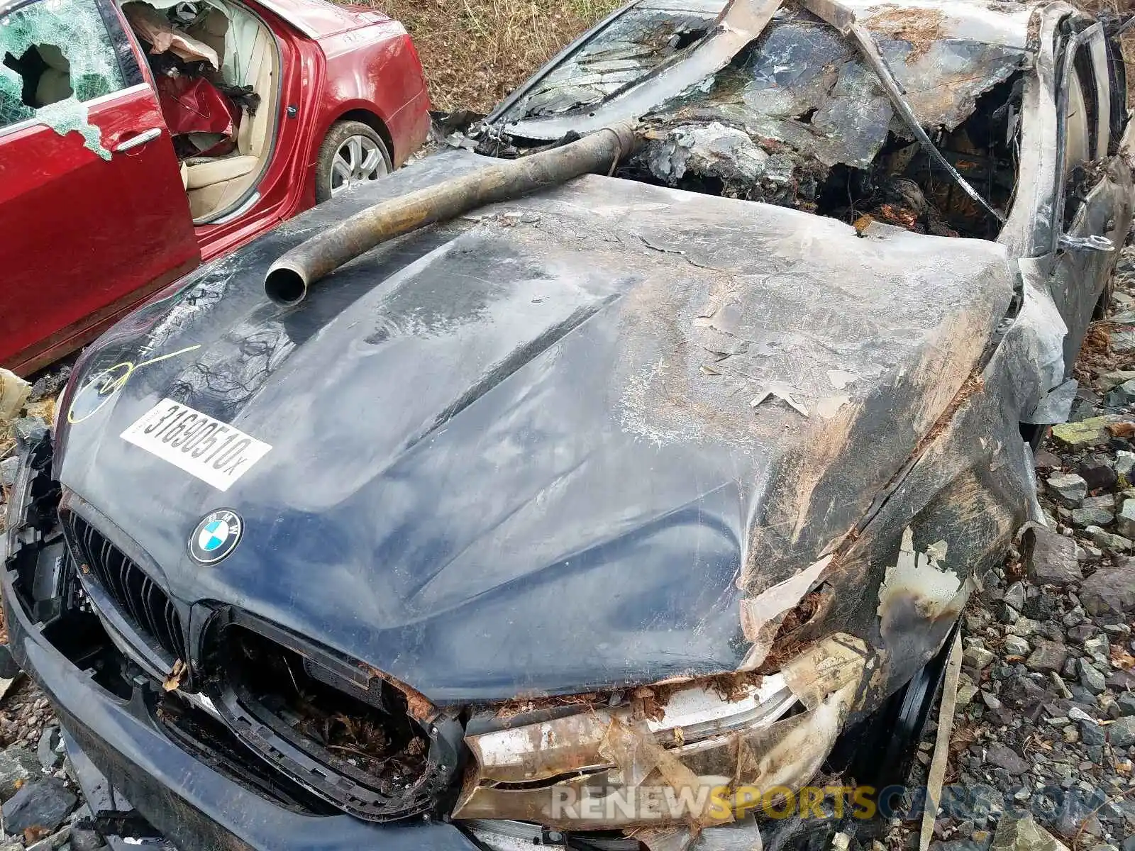 7 Photograph of a damaged car WBSJF0C52KB446824 BMW M5 2019