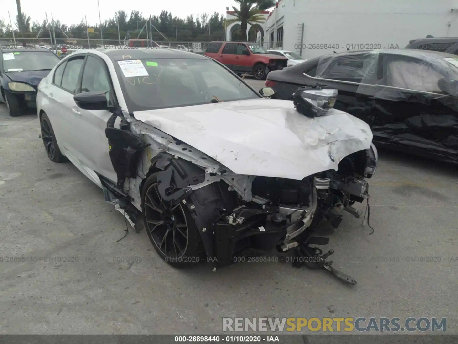 6 Photograph of a damaged car WBSJF0C54KB447005 BMW M5 2019