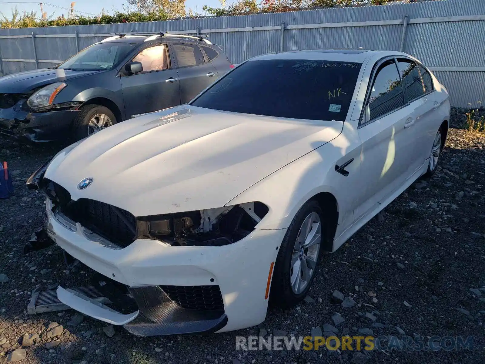 2 Photograph of a damaged car WBSJF0C55KB448714 BMW M5 2019