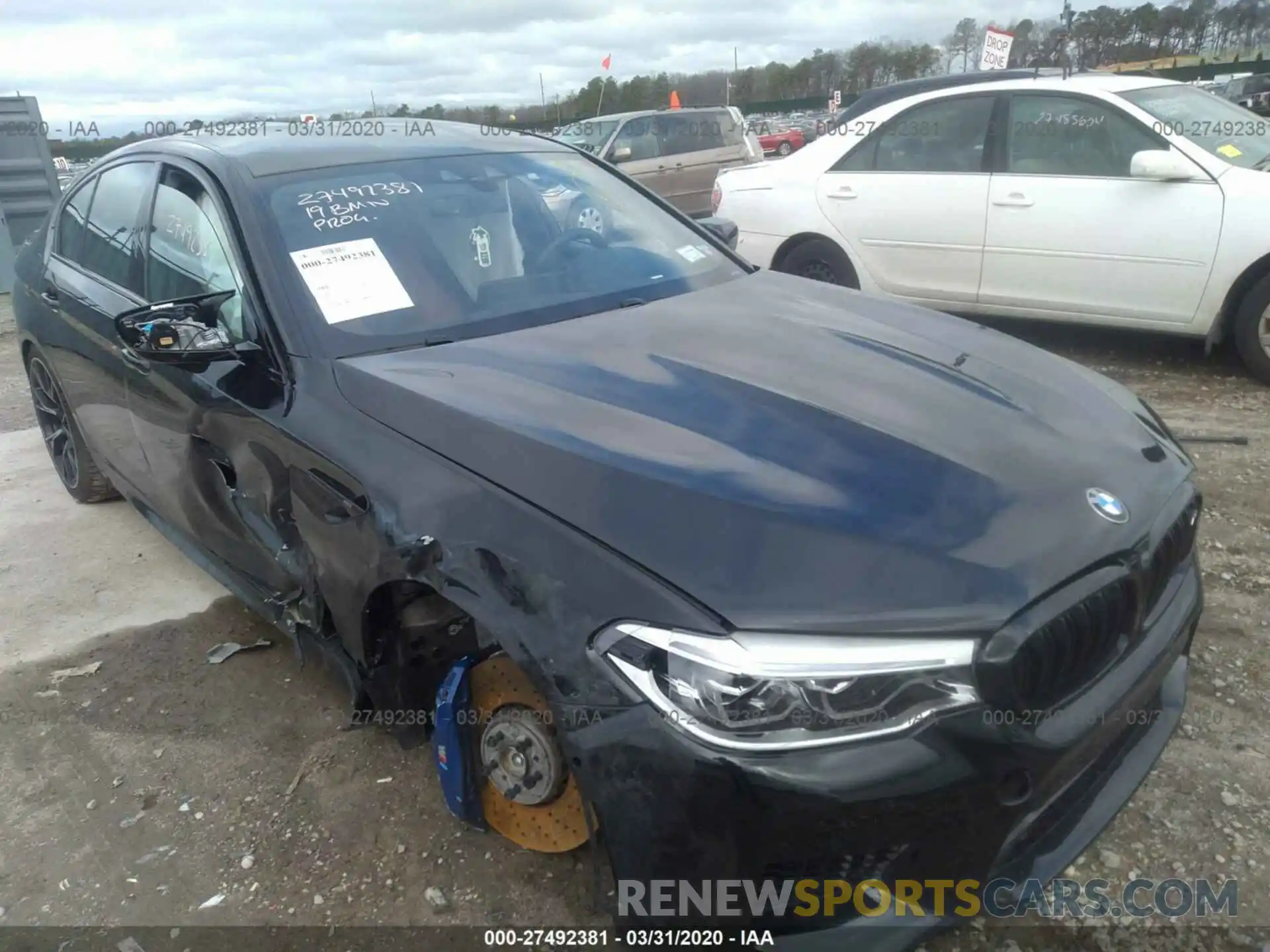 6 Photograph of a damaged car WBSJF0C58KB285931 BMW M5 2019