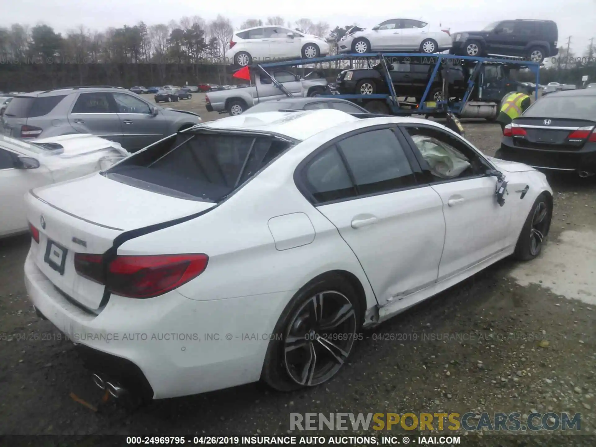 4 Photograph of a damaged car WBSJF0C59KB284190 BMW M5 2019