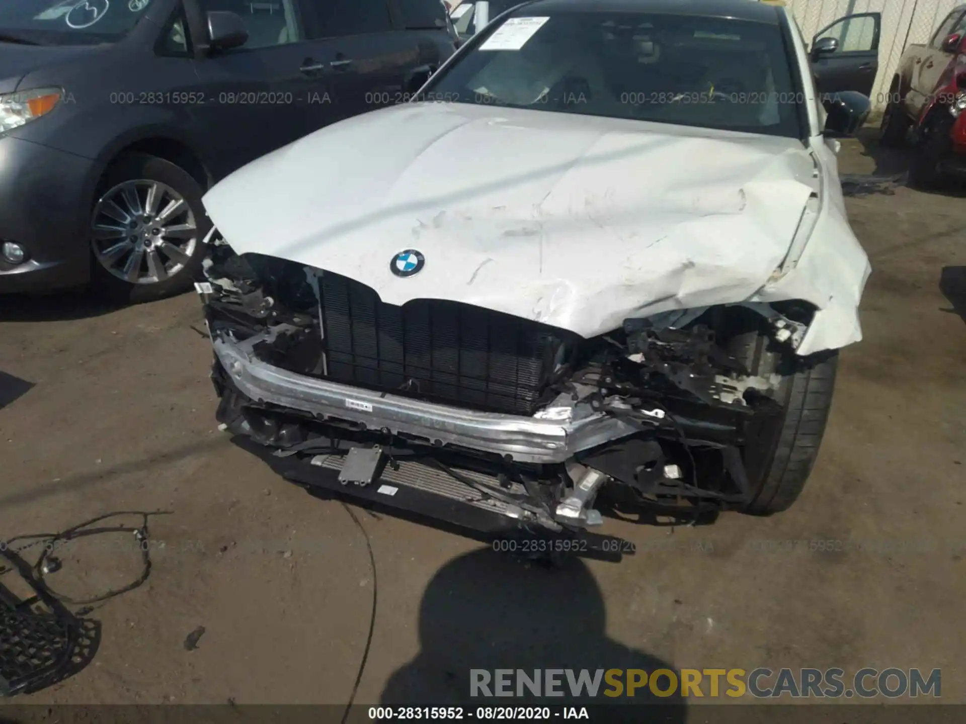 6 Photograph of a damaged car WBSJF0C59KB447811 BMW M5 2019