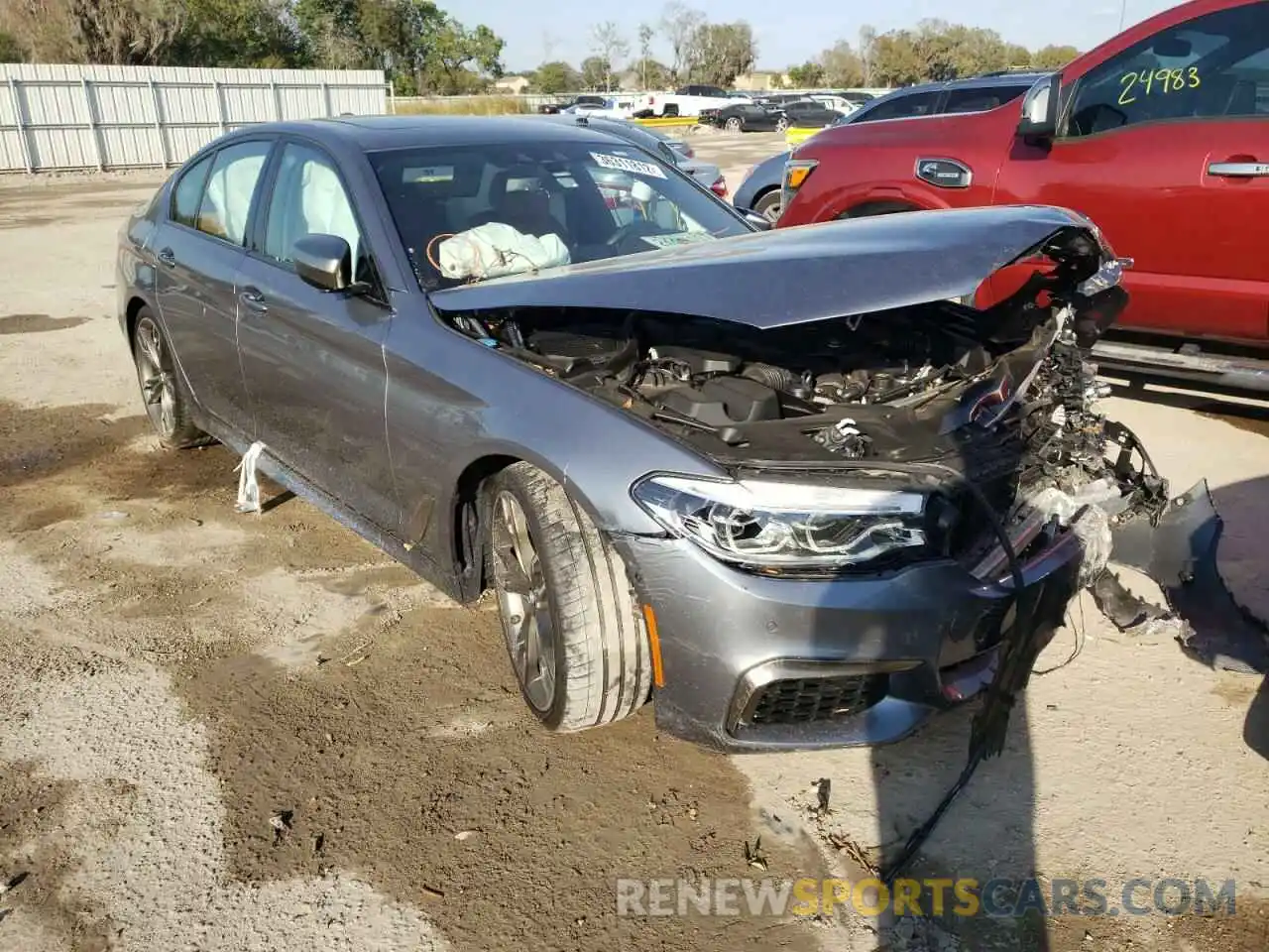 1 Photograph of a damaged car WBAJS7C01LBN96633 BMW M5 2020