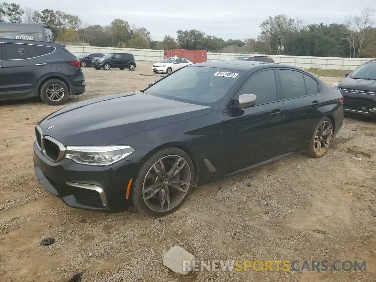 1 Photograph of a damaged car WBAJS7C05LCD23496 BMW M5 2020