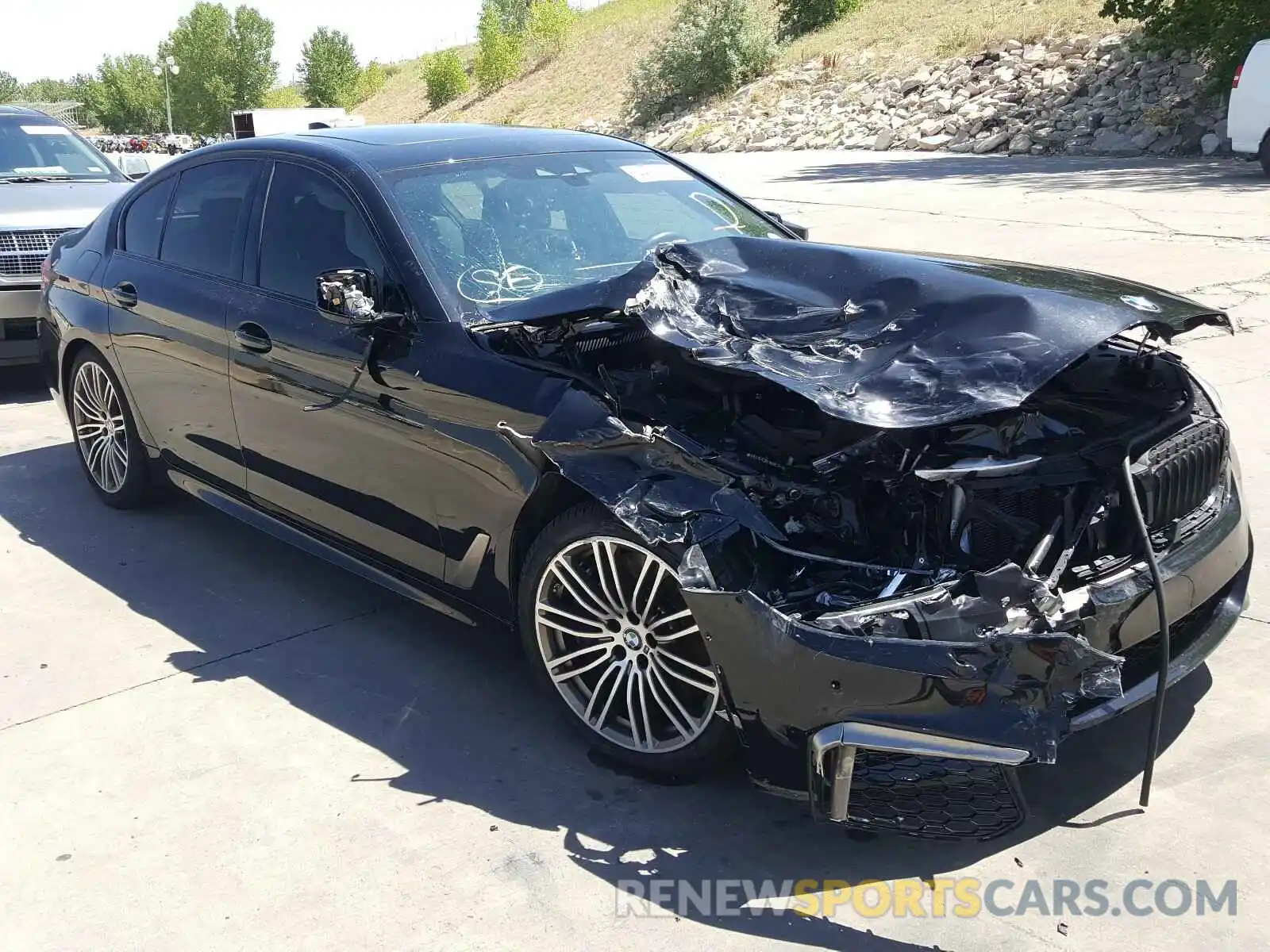 1 Photograph of a damaged car WBAJS7C06LBN96384 BMW M5 2020