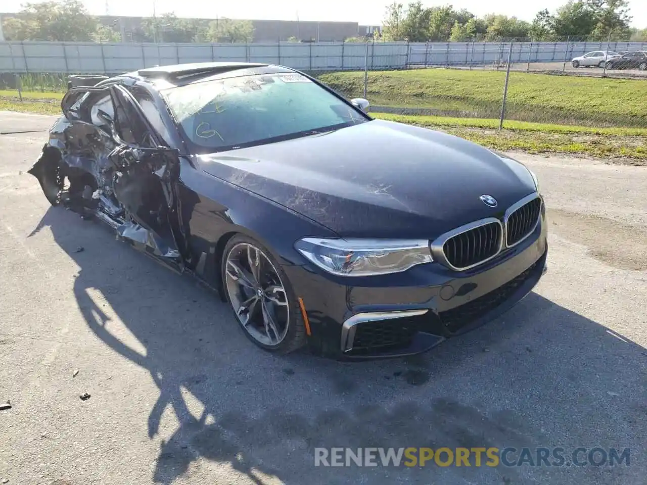 1 Photograph of a damaged car WBAJS7C06LCD52702 BMW M5 2020