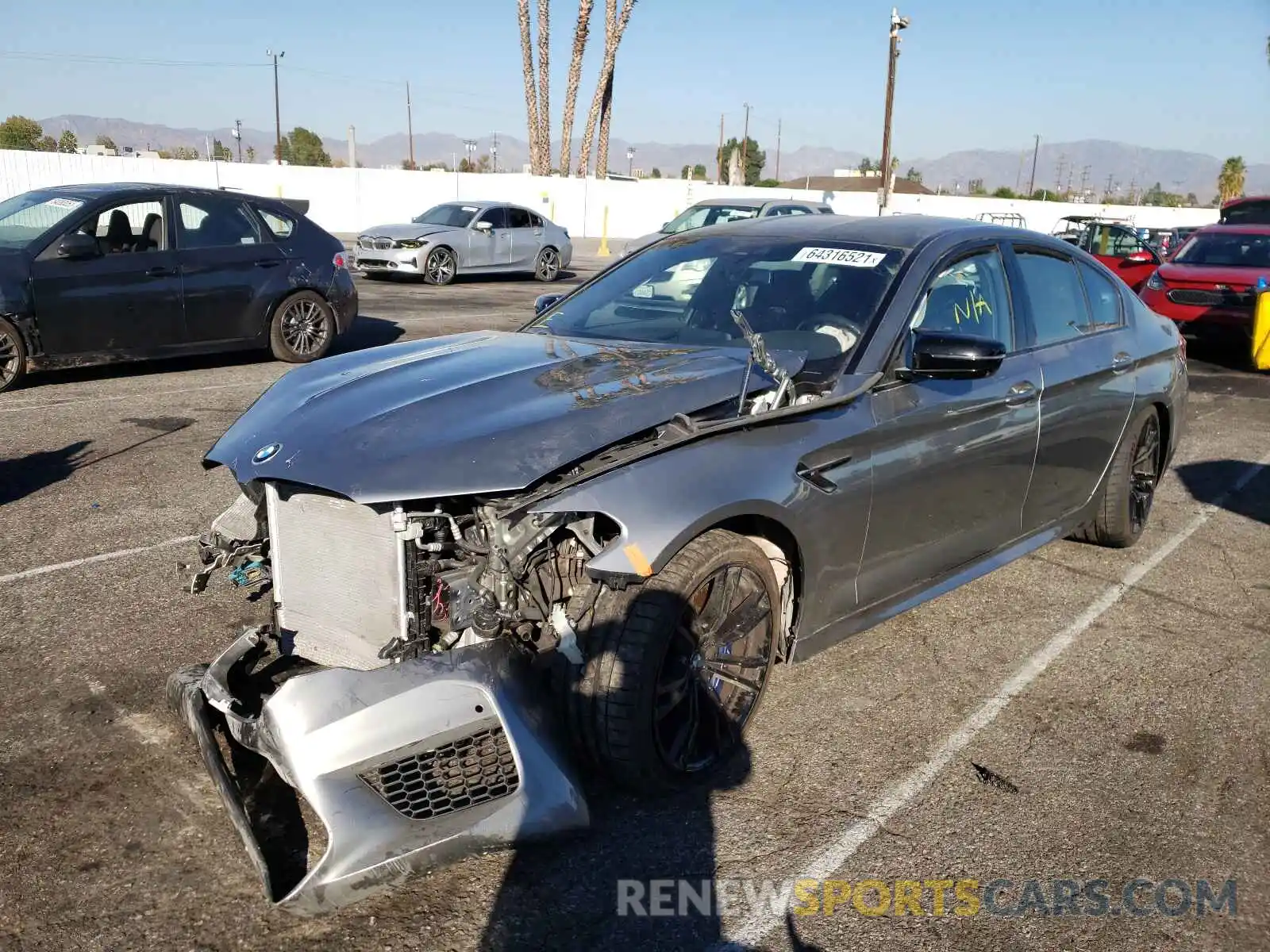 2 Photograph of a damaged car WBSJF0C09LCD54225 BMW M5 2020