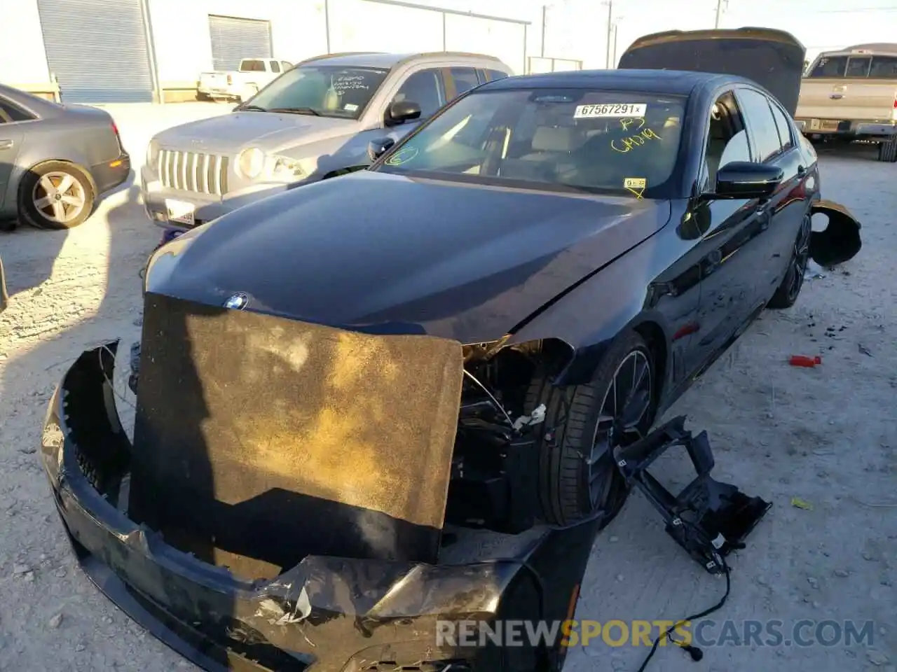 2 Photograph of a damaged car WBA13BK09MCG19219 BMW M5 2021