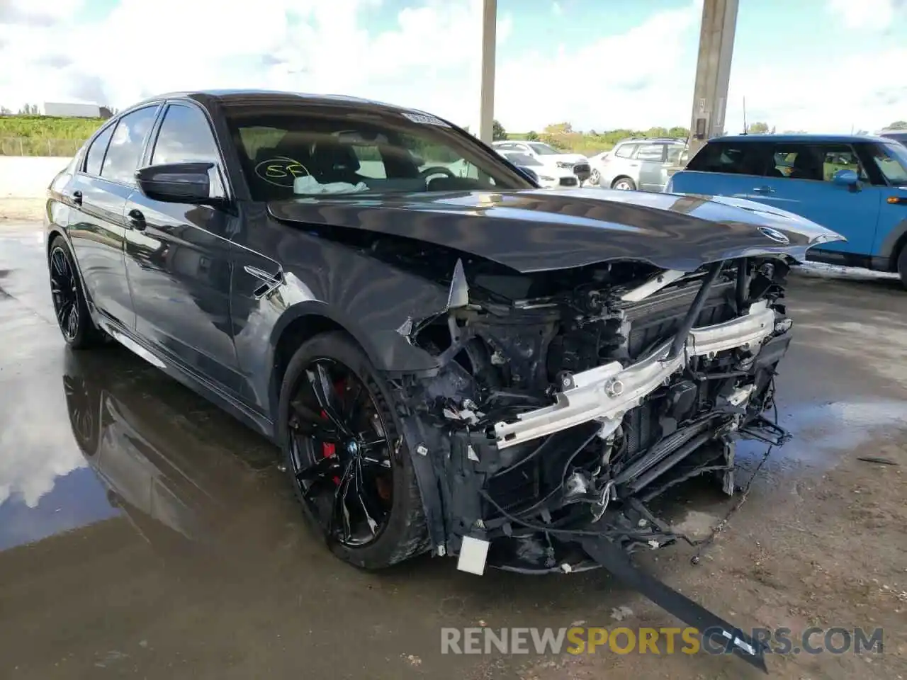 1 Photograph of a damaged car WBS83CH01MCF25262 BMW M5 2021