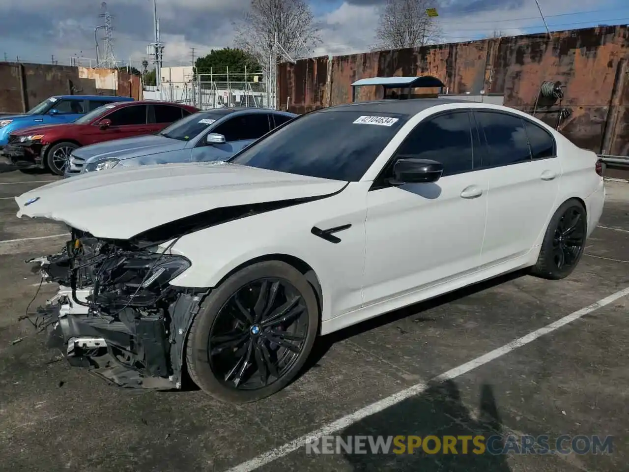 1 Photograph of a damaged car WBS83CH06MCG00652 BMW M5 2021