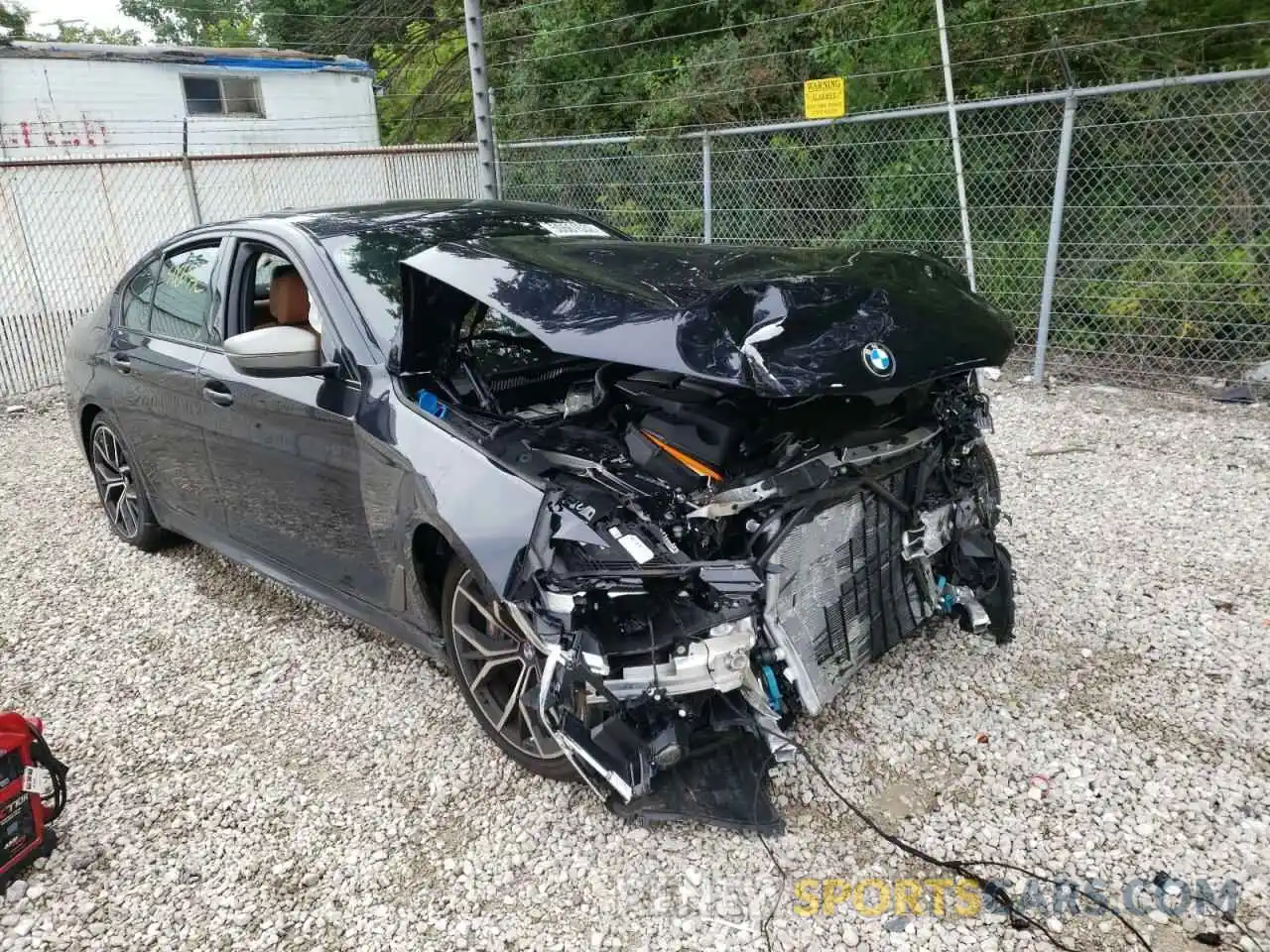 1 Photograph of a damaged car WBA13BK02NCJ65944 BMW M5 2022