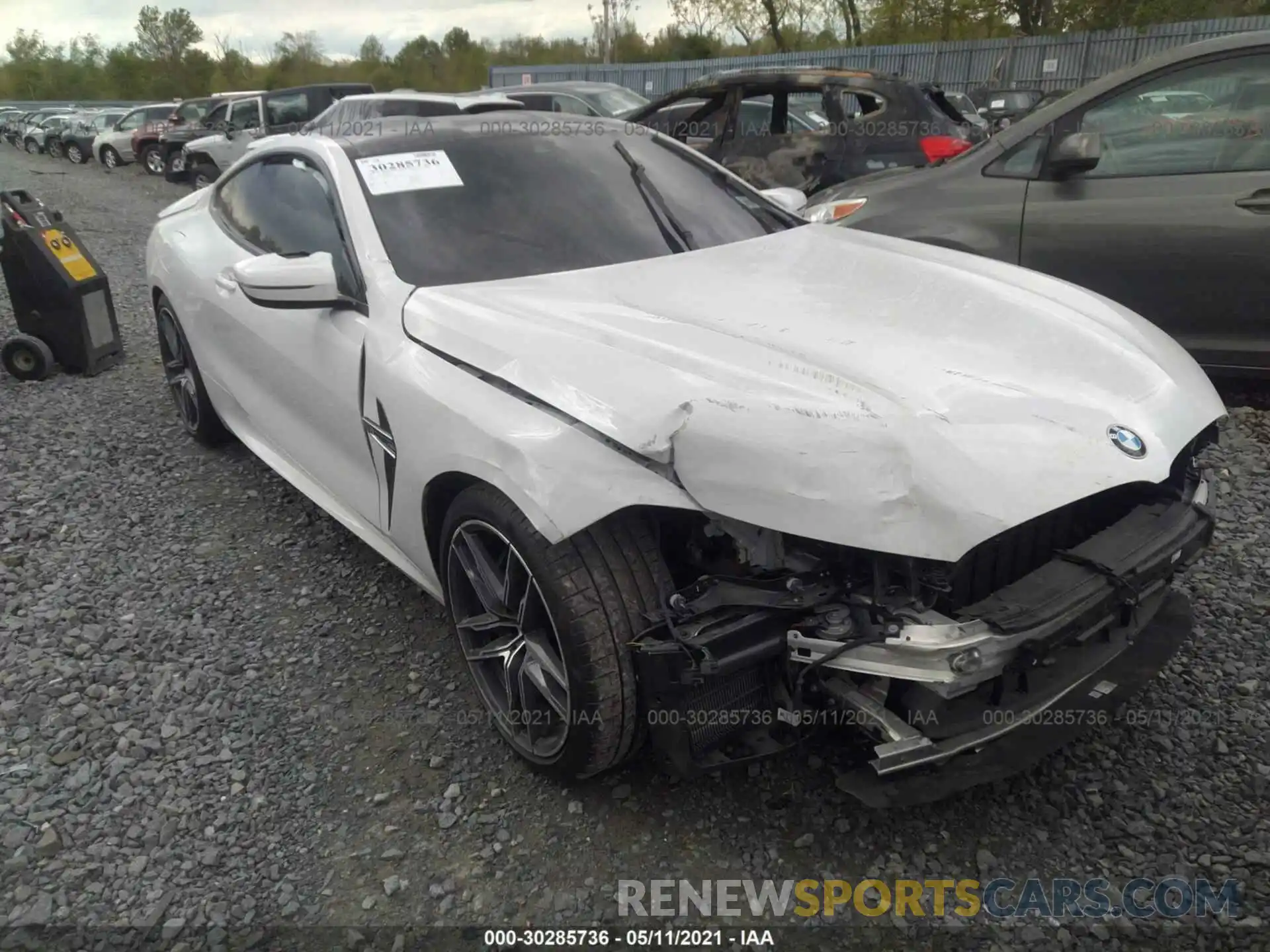 1 Photograph of a damaged car WBSAE0C05LCD29728 BMW M8 2020