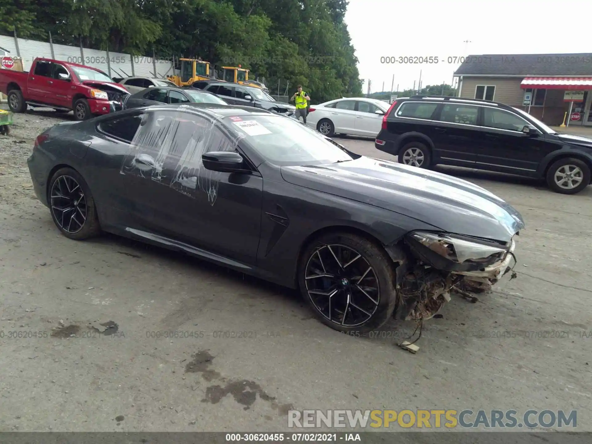 1 Photograph of a damaged car WBSAE0C0XLCD60571 BMW M8 2020