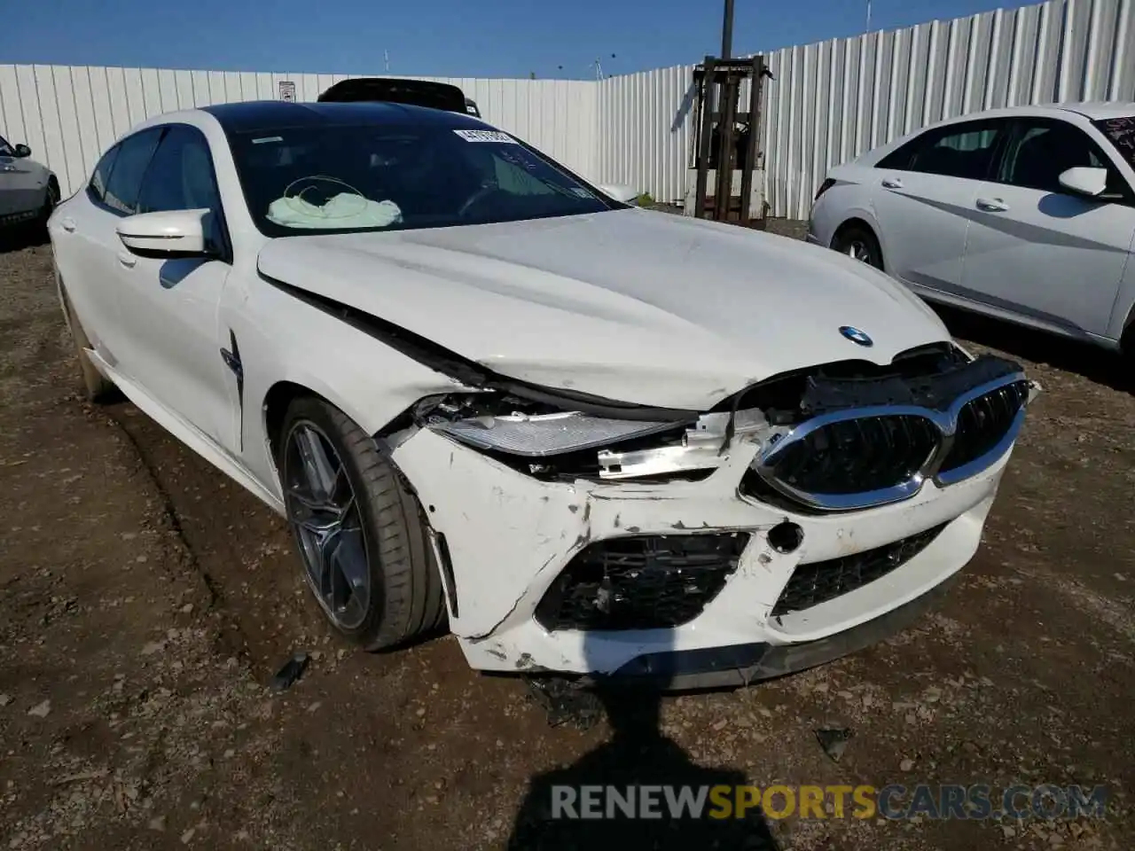 1 Photograph of a damaged car WBSGV0C07LCD74812 BMW M8 2020