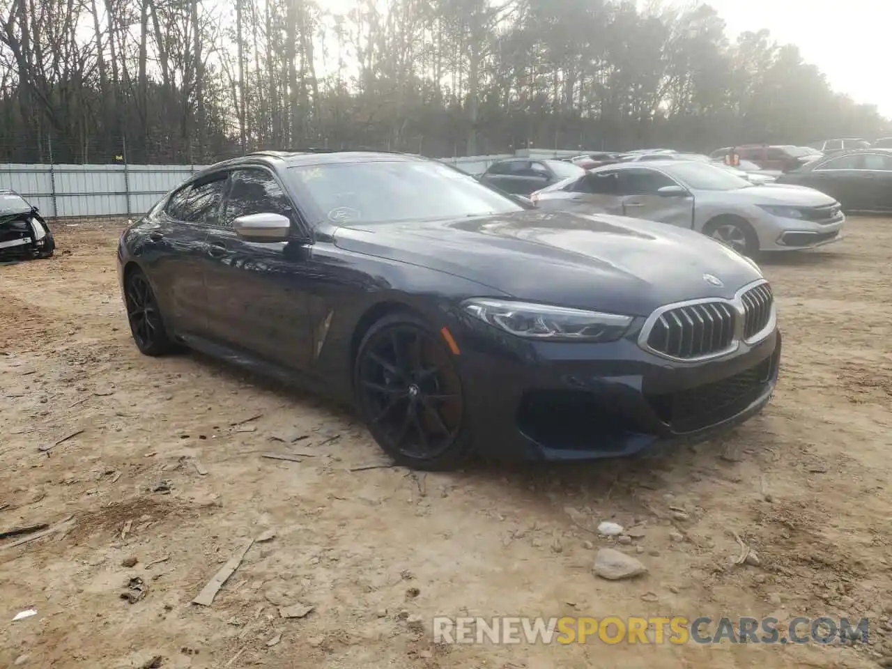 1 Photograph of a damaged car WBAGV8C01MCF26944 BMW M8 2021