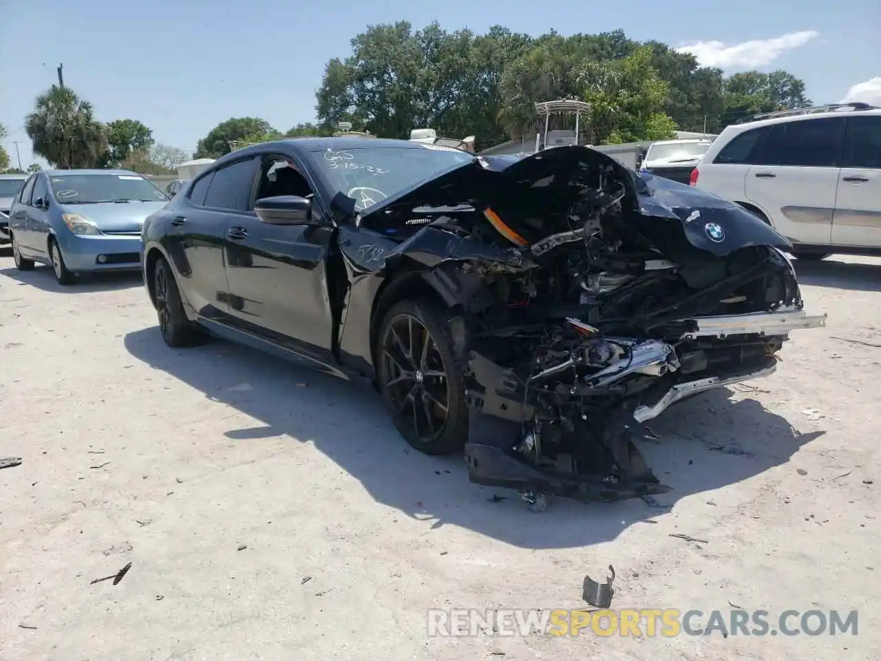 1 Photograph of a damaged car WBAGV8C03MCG29606 BMW M8 2021