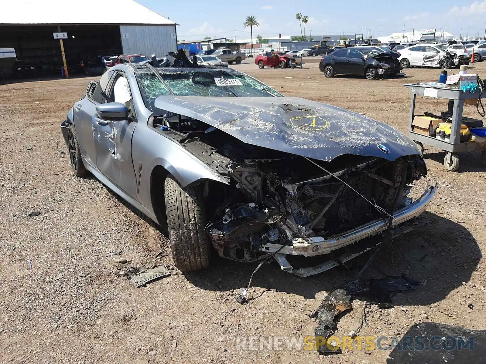 1 Photograph of a damaged car WBAGV8C06MCF72480 BMW M8 2021